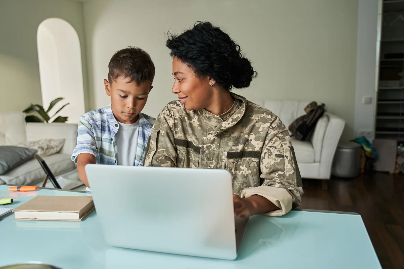 Servicemember parent and child at home, getting started with Solagree's military divorce process